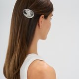 Small oval rhodiumplated hair barrette