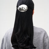 Large oval rhodium-plated hair barrette
