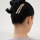 Goldplated hair barrette with baguette crystals
